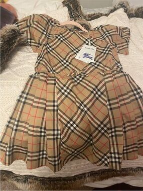 Burberry Beige Nova Check Pleated Dress with Red & Black Accents. Pending sale